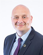 A photograph of Councillor Lee Carter